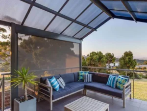 Modern patio with stylish outdoor blinds Adelaide, providing shade and comfort
