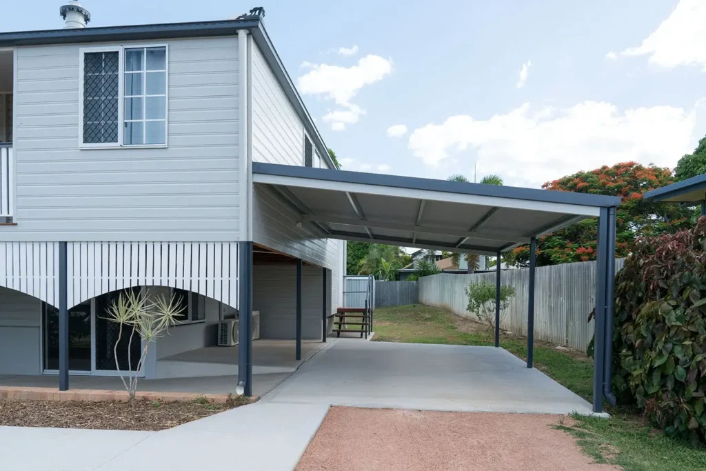a flat roof pergola carport on the side of an australian home