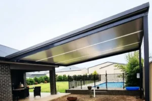 A skillion or reverse flat pergola attached to a home.