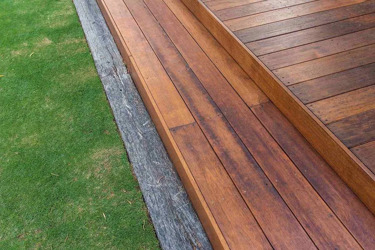 merbau decking next to a green lawn.